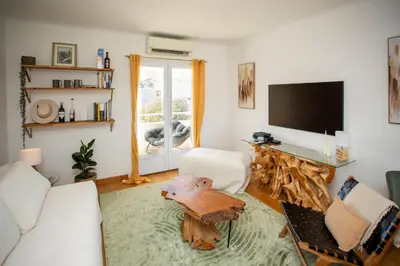 Télévision ou salle de divertissement dans l'établissement Penthouse apartment with panoramic views