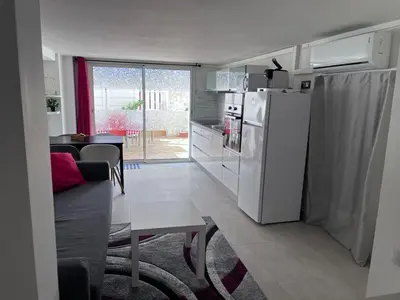 Cuisine ou kitchenette dans l'établissement duplex en bord de mer