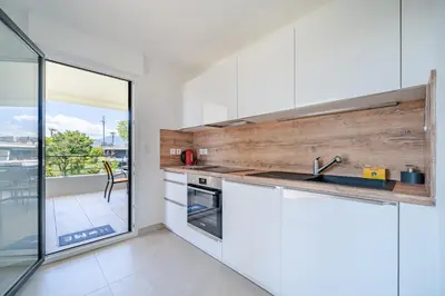 Cuisine ou kitchenette dans l'établissement Rooftop 3 pièces avec Piscine face mer