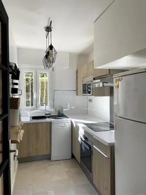 Cuisine ou kitchenette dans l'établissement Appartement - Chez Laura