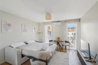 Un ou plusieurs lits dans un hébergement de l'établissement Cozy Cannes