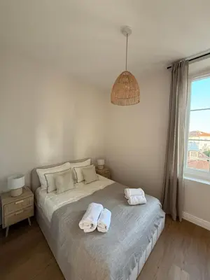 Un ou plusieurs lits dans un hébergement de l'établissement Maison Dalaise - Cannes