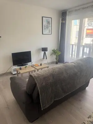 Télévision ou salle de divertissement dans l'établissement Appartement cosy