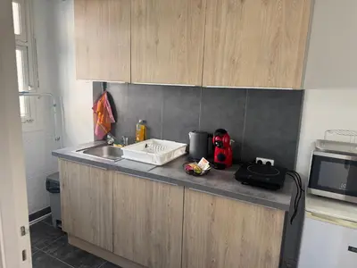 Cuisine ou kitchenette dans l'établissement Appartement cosy