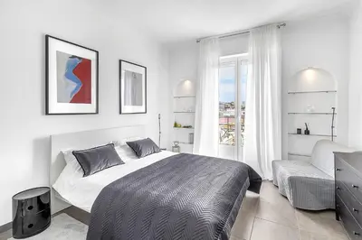 Un ou plusieurs lits dans un hébergement de l'établissement Croisette 65 apartment-Miramar residence