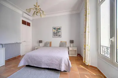 Un ou plusieurs lits dans un hébergement de l'établissement Lumineux 2 chambres, CARRE D'OR-COEUR DE CANNES A2B196