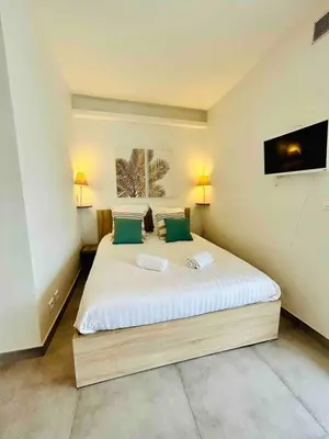 Un ou plusieurs lits dans un hébergement de l'établissement Villa d'Este - Studio 2 people - pool - 2 min to beach
