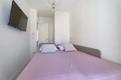 Un ou plusieurs lits dans un hébergement de l'établissement Rose des Sables - 4min à pied de la Plage