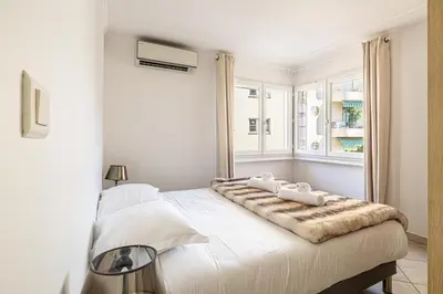 Un ou plusieurs lits dans un hébergement de l'établissement 78 LERINS - Bel appartement 2 chambres sur la Croisette