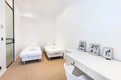 Un ou plusieurs lits dans un hébergement de l'établissement Le 121 - LOFT design Rue d'Antibes