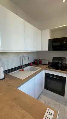 Cuisine ou kitchenette dans l'établissement Nouveau ! au centre de Juan, Studio climatisé rénové tout confort à 2 minutes des plages
