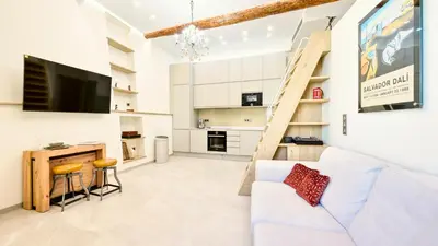 Cuisine ou kitchenette dans l'établissement Le Palais Aubernon