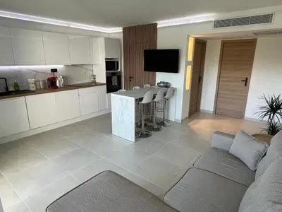 Cuisine ou kitchenette dans l'établissement Appartement vu mer et montagnes