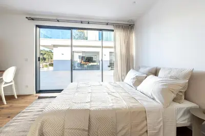 Un ou plusieurs lits dans un hébergement de l'établissement Villa Dream Cannes