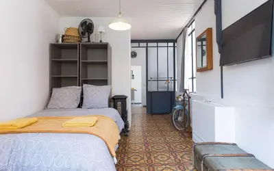 Un ou plusieurs lits dans un hébergement de l'établissement Aura Apartments by Halldis
