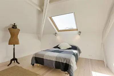 Un ou plusieurs lits dans un hébergement de l'établissement Aura Apartments by Halldis