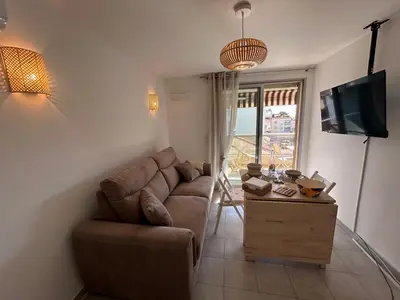 Coin salon dans l'établissement Appartement cosy à 200 m de la mer