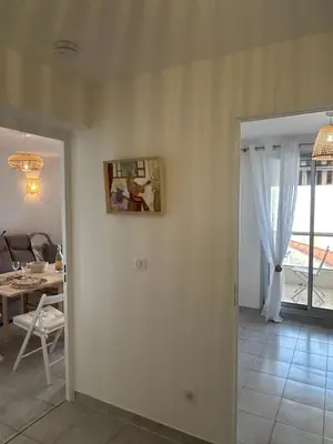 Coin salon dans l'établissement Appartement cosy à 200 m de la mer