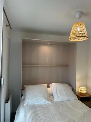 Un ou plusieurs lits dans un hébergement de l'établissement Appartement cosy à 200 m de la mer