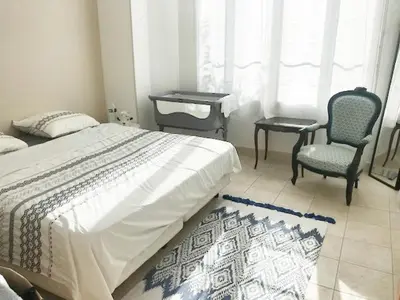 Un ou plusieurs lits dans un hébergement de l'établissement Appartement au coeur d'Antibes