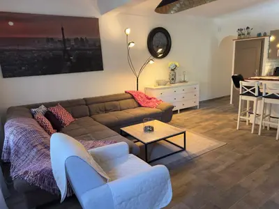 Coin salon dans l'établissement Fleurs Apartment Cap d'Antibes