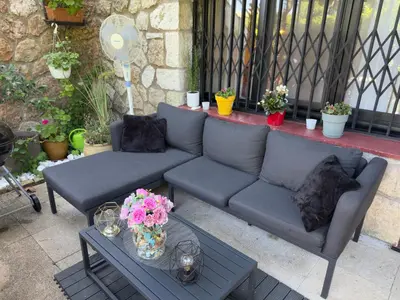 Coin salon dans l'établissement Fleurs Apartment Cap d'Antibes