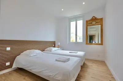 Un ou plusieurs lits dans un hébergement de l'établissement Cosy Muguets - Luxury Apartment for 6 People with Sea View