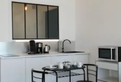 Cuisine ou kitchenette dans l'établissement La caravelle