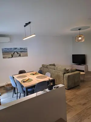 Télévision ou salle de divertissement dans l'établissement Appartement spacieux