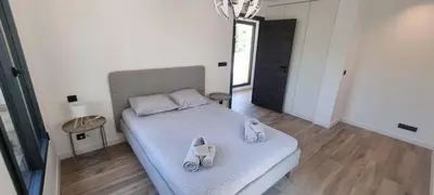 Un ou plusieurs lits dans un hébergement de l'établissement Beautiful Luxury Villa with Pool in Antibes