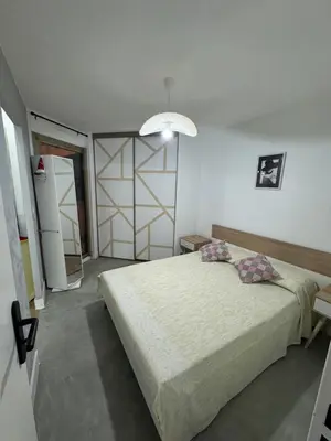 Un ou plusieurs lits dans un hébergement de l'établissement Studio 30m2 juan les pins