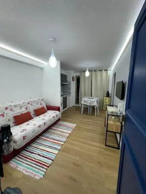 Coin salon dans l'établissement Studio 30m2 juan les pins