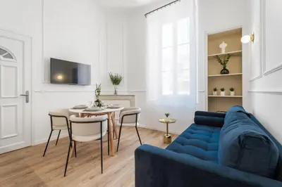 Coin salon dans l'établissement Appartement Prado - Welkeys