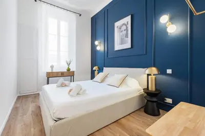 Un ou plusieurs lits dans un hébergement de l'établissement Appartement Prado - Welkeys