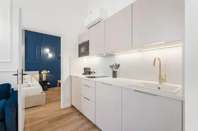 Cuisine ou kitchenette dans l'établissement Appartement Prado - Welkeys