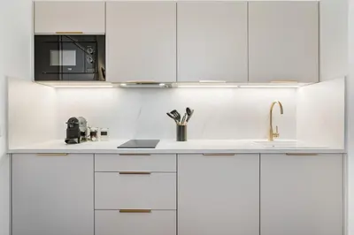 Cuisine ou kitchenette dans l'établissement Appartement Prado - Welkeys