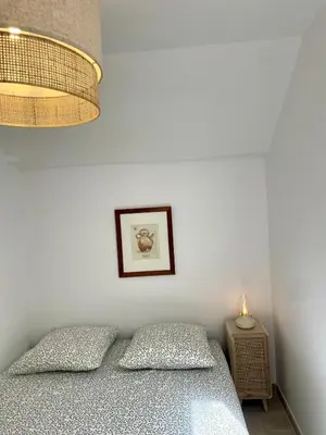 Un ou plusieurs lits dans un hébergement de l'établissement Les Appartements de la rue Vial