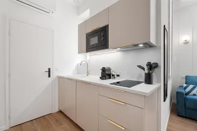 Cuisine ou kitchenette dans l'établissement Studio Bella - Welkeys