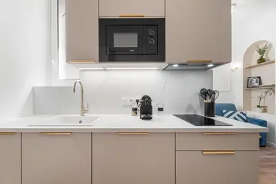 Cuisine ou kitchenette dans l'établissement Studio Bella - Welkeys