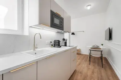 Cuisine ou kitchenette dans l'établissement Studio Bella - Welkeys