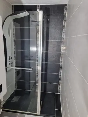 Salle de bains dans l'établissement charmant appartement avec piscine