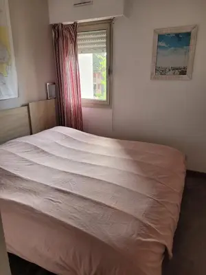 Un ou plusieurs lits dans un hébergement de l'établissement Appartement 2 chambres à 5 min à pieds de la plage et tout commerce