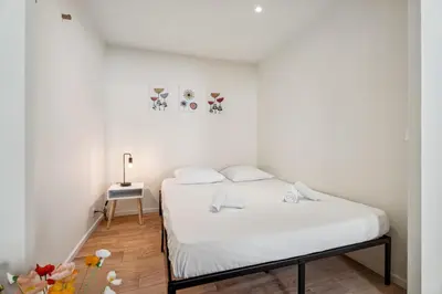 Un ou plusieurs lits dans un hébergement de l'établissement Appartement T1bis Diane - Welkeys