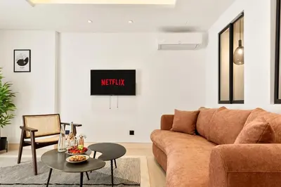 Coin salon dans l'établissement Suite L Ecrin Élégance confort au cœur de Cannes