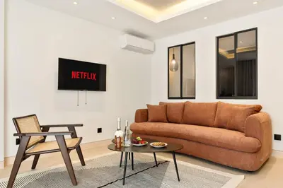 Coin salon dans l'établissement Suite L Ecrin Élégance confort au cœur de Cannes