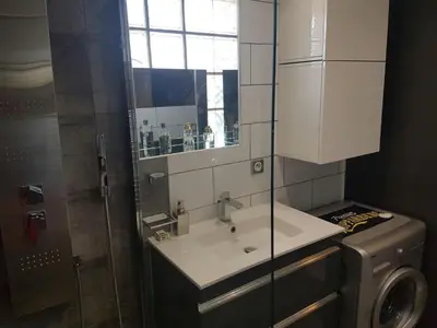 Cuisine ou kitchenette dans l'établissement Studio au calme
