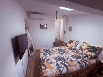 Un ou plusieurs lits dans un hébergement de l'établissement Charme, Pierres, Appartement Vieil Antibes