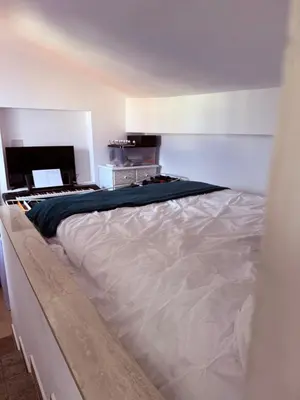 Un ou plusieurs lits dans un hébergement de l'établissement Charme, Pierres, Appartement Vieil Antibes