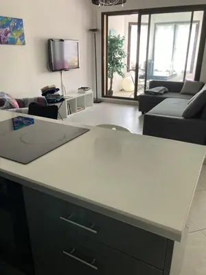 Télévision ou salle de divertissement dans l'établissement Superbe 2 pièces 55 m2 Juàn les pins