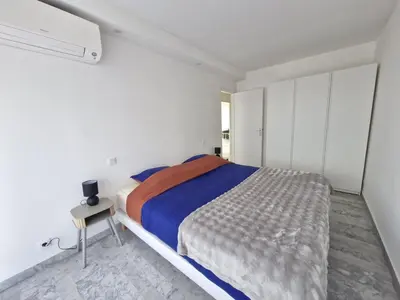 Un ou plusieurs lits dans un hébergement de l'établissement TANIT Incroyable vue sur des Îles